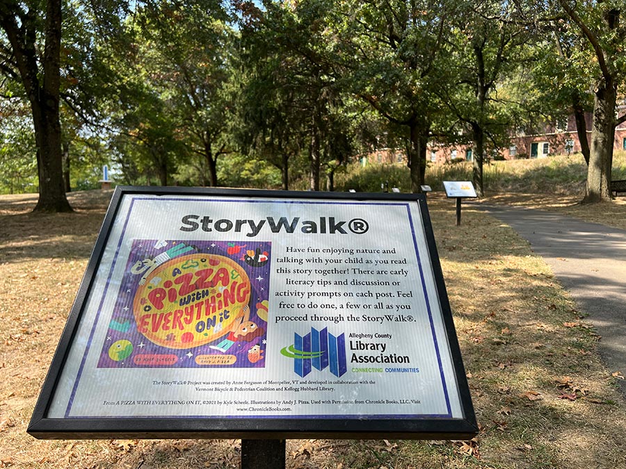 A Photo of Pizza with Everything on it Storywalk board